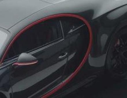 Looksmart 1:43 Bugatti Chiron Sport grey carbon with italian red frame 